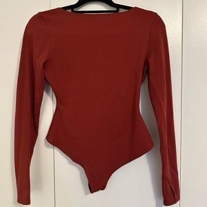 Solid long sleeve body suit